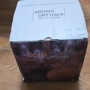Aroma Diffuser with 7 LED Color Options Remote N Oils Included